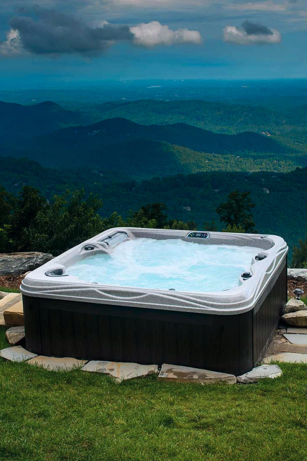 hot tub overlooking green hills bozeman mt